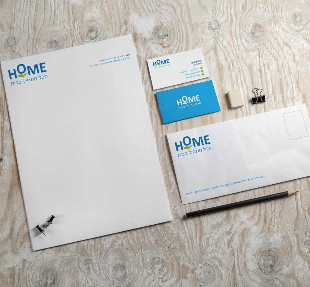 Blank stationery and corporate identity template on light wooden background. Mock-up for graphic designers portfolios. Top view.